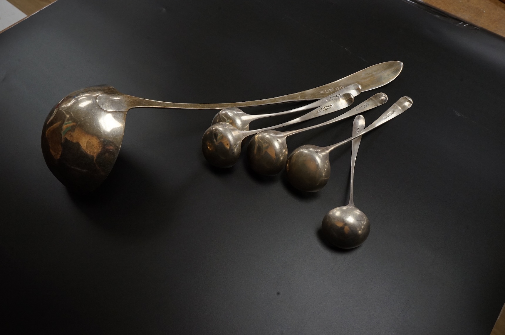 A set of four George III Scottish silver Old English pattern toddy ladles, James McKay, Edinburgh, 1809, 17.4cm, one other smaller Scottish silver ladle and a George III Scottish silver Celtic tip soup ladle, Francis How